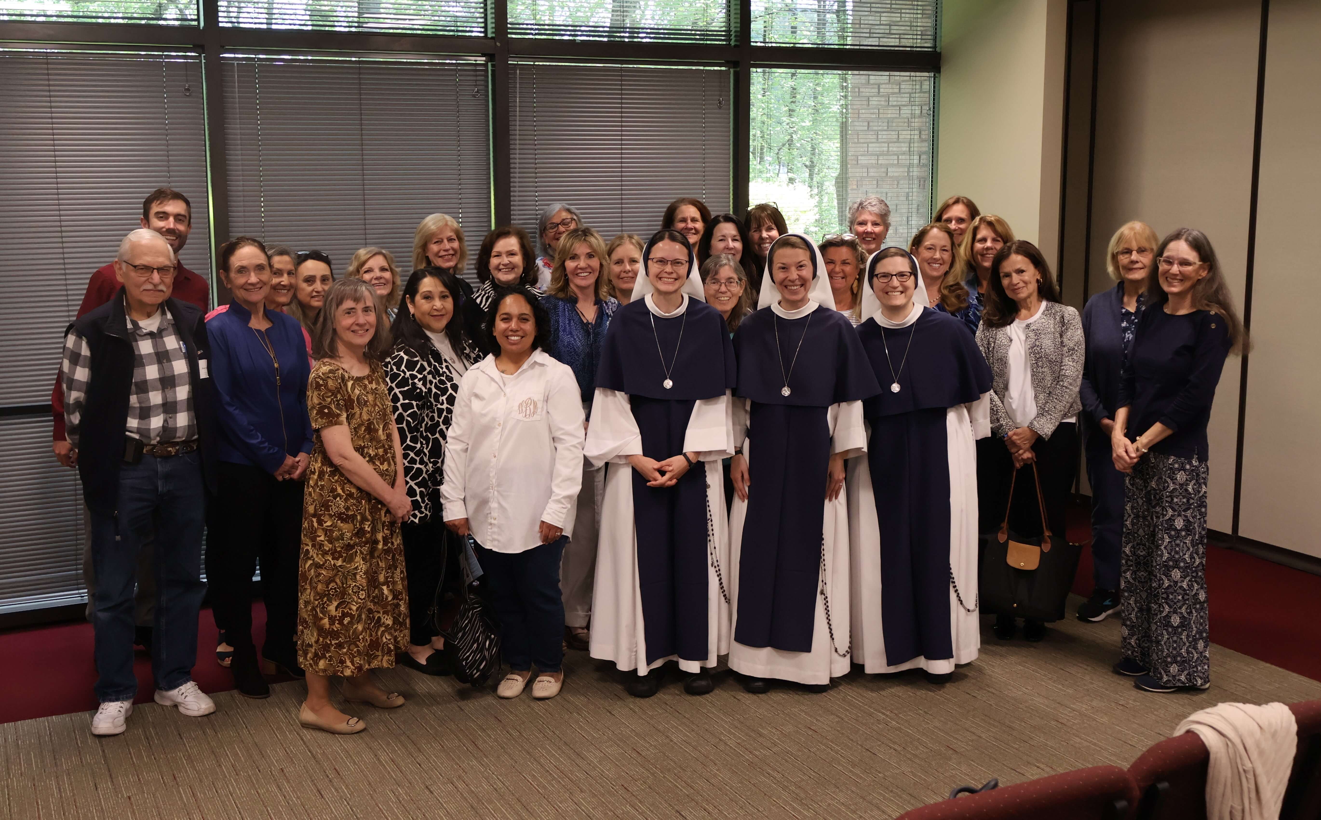 Three Sisters of Life pose with Archdiocese of Atlanta Pro-Life Leaders and Advocates
